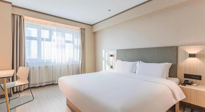Hanting Hotel Harbin Railway Station Square Exterior foto